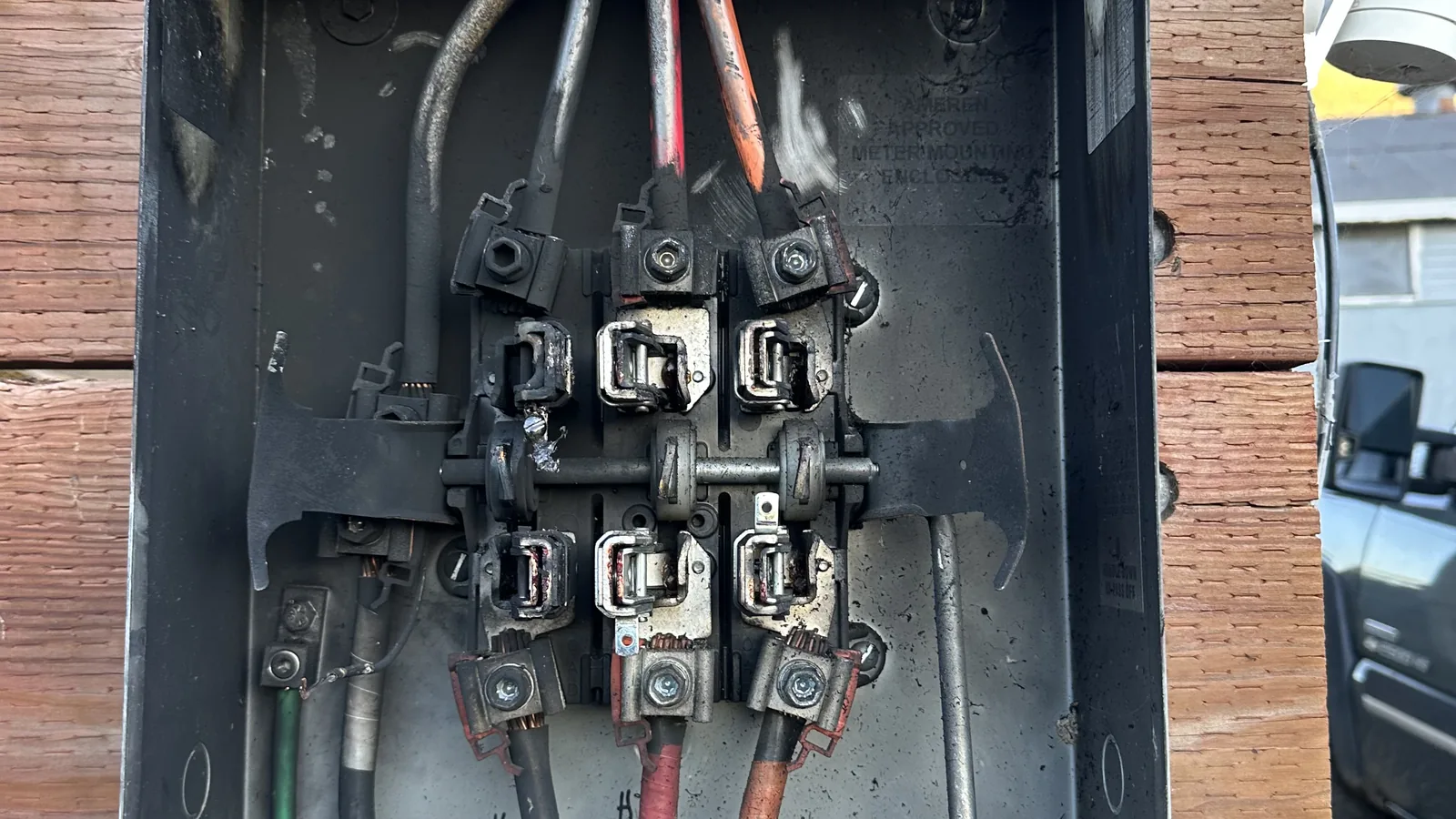Meter socket jaw assembly with service conductors landed at a Sonoma County property
